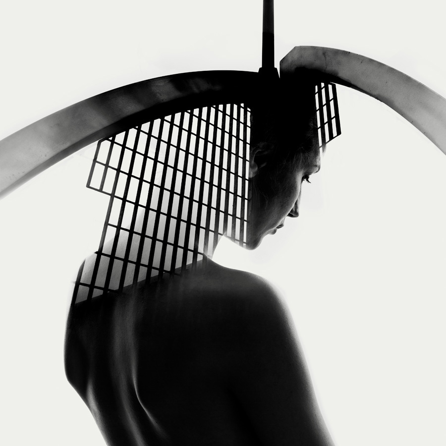 double exposure nude of a woman with a metal structure